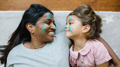 Woman and child with matching face paints